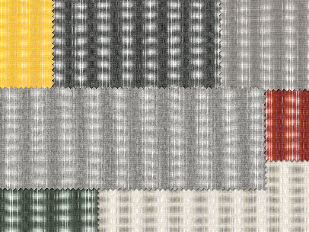 Tissu avec plusieurs carrés colorés dans des teintes de gris, jaune, rouge et vert. Tissu avec plusieurs carrés colorés dans des teintes de gris, jaune, rouge et vert.