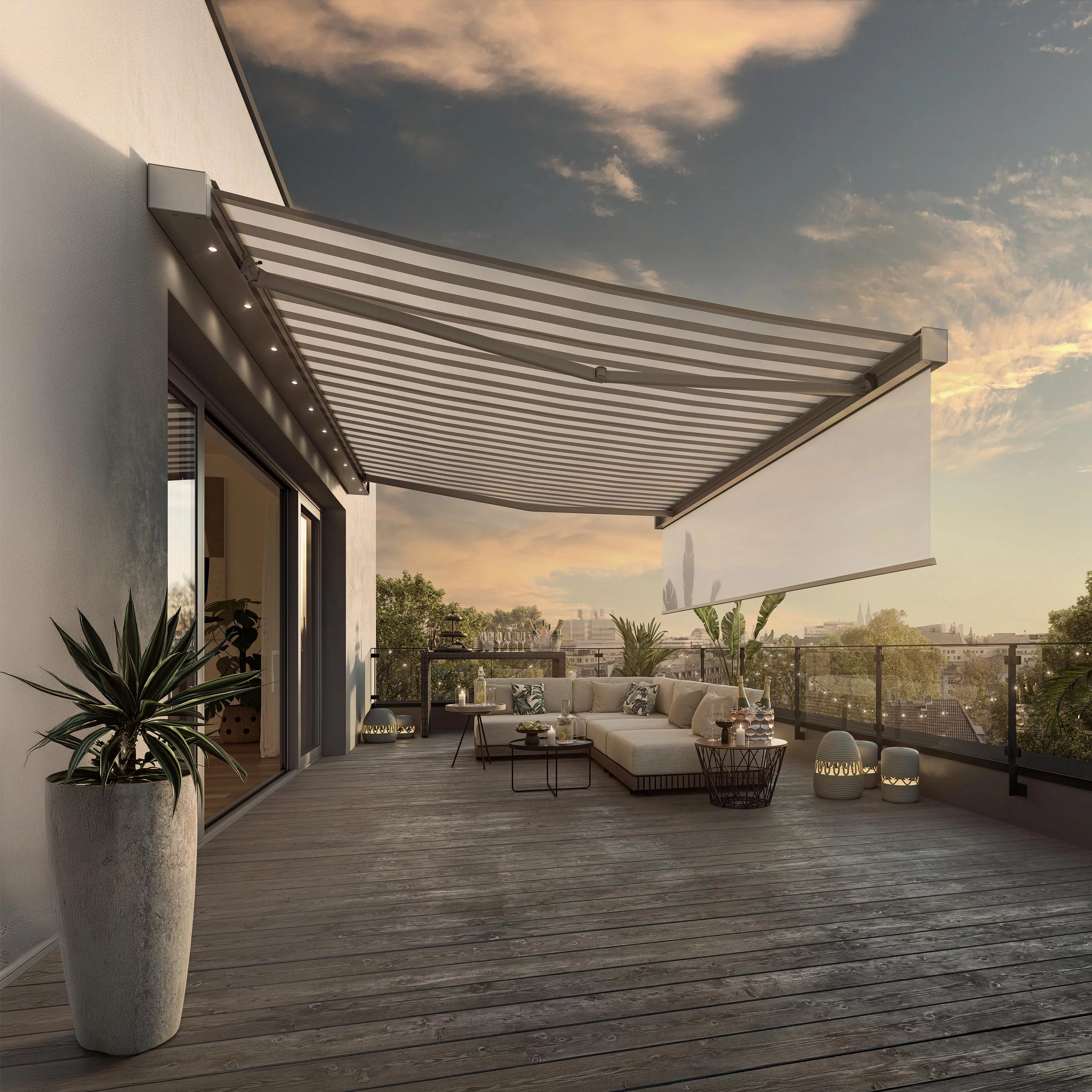 Vue d'une terrasse moderne avec une overhanging en toile rayée et plusieurs éléments de mobilier.