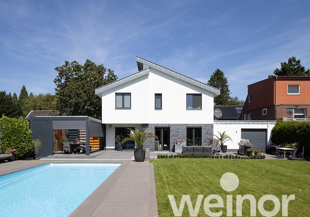 Erkelenz : terrasse protégée contre les intempéries au bord de la piscine  