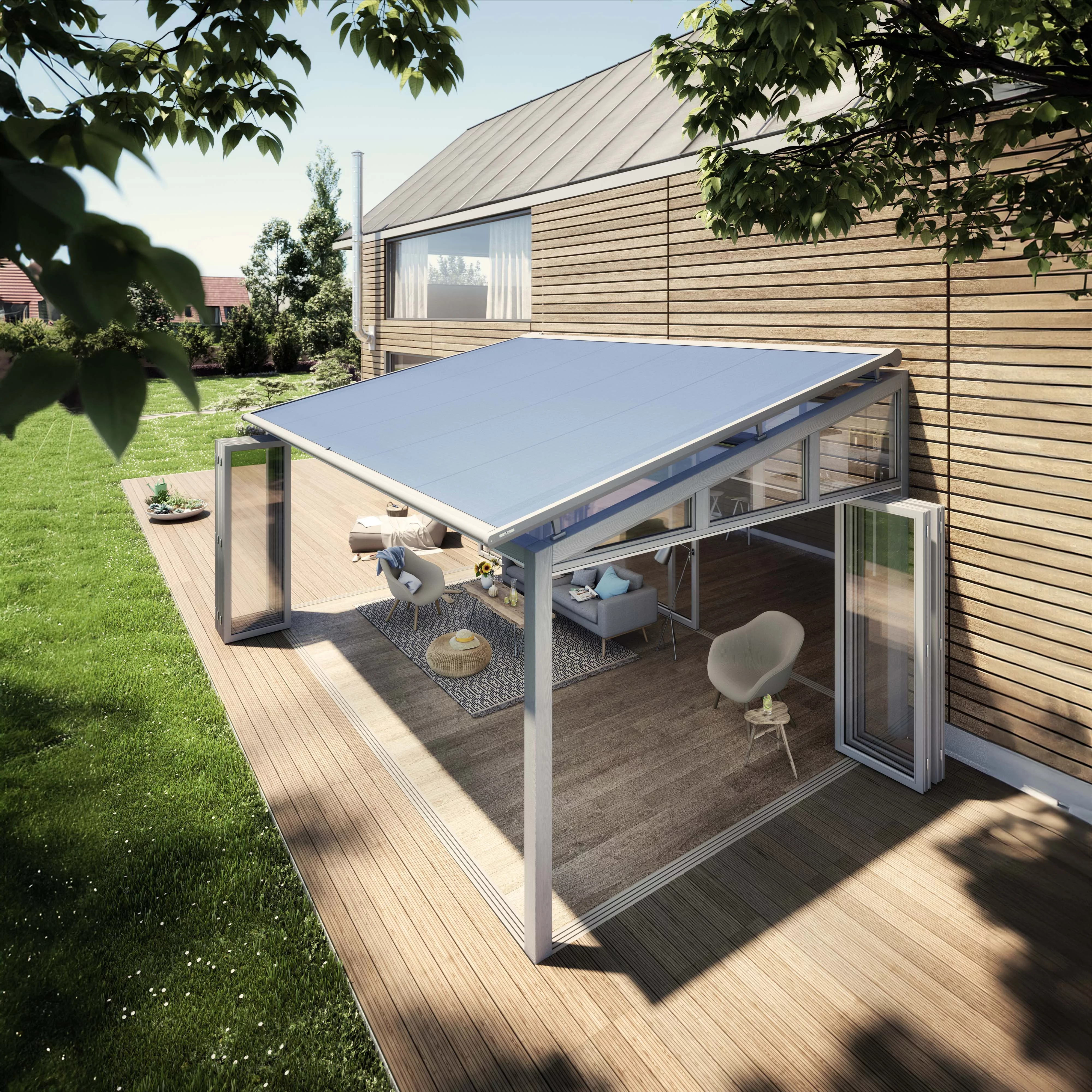 Vue d'une surélevation moderne avec une toiture en pente et des parois vitrées, intégrée dans un jardin verdoyant.