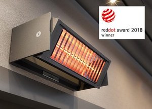 Appareil de chauffage mural avec design rectangulaire et luminance orange. Logo du prix Red Dot 2018 en haut à droite.